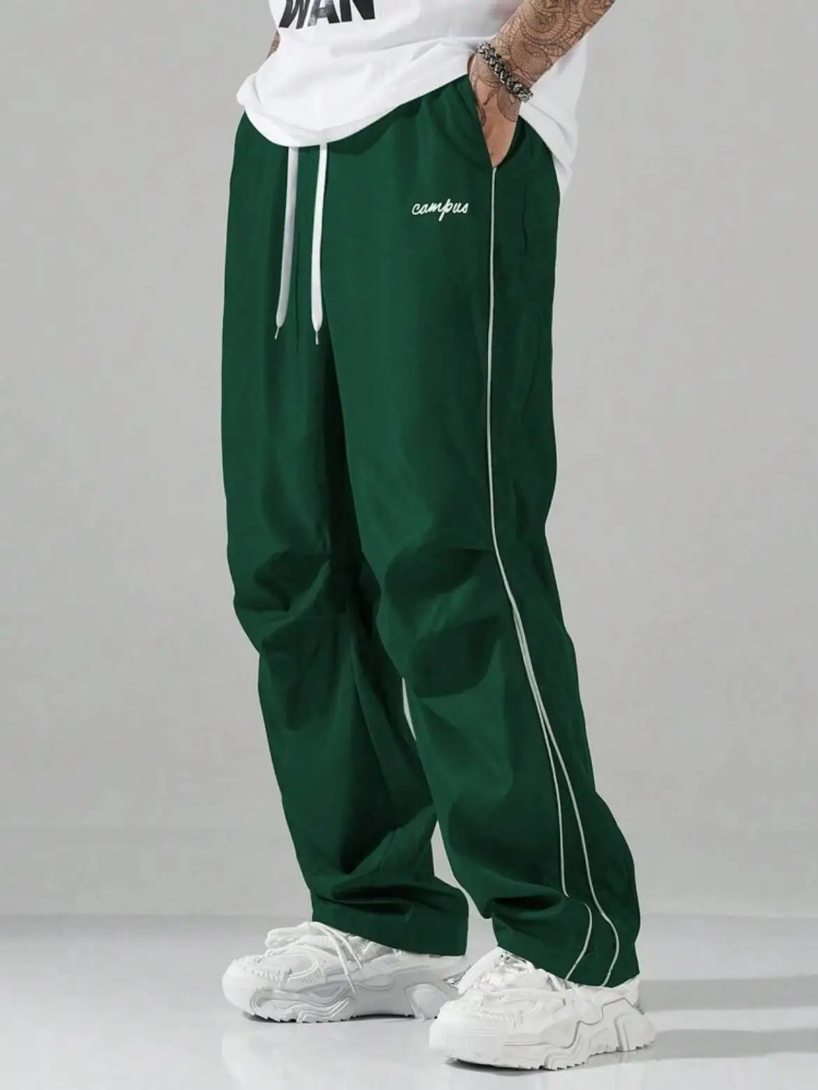 Men's Striped Three - Color Casual Pants with Pockets, Suitable for Sports, Fitness and Jogging  。