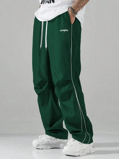 Men's Striped Three - Color Casual Pants with Pockets, Suitable for Sports, Fitness and Jogging  。