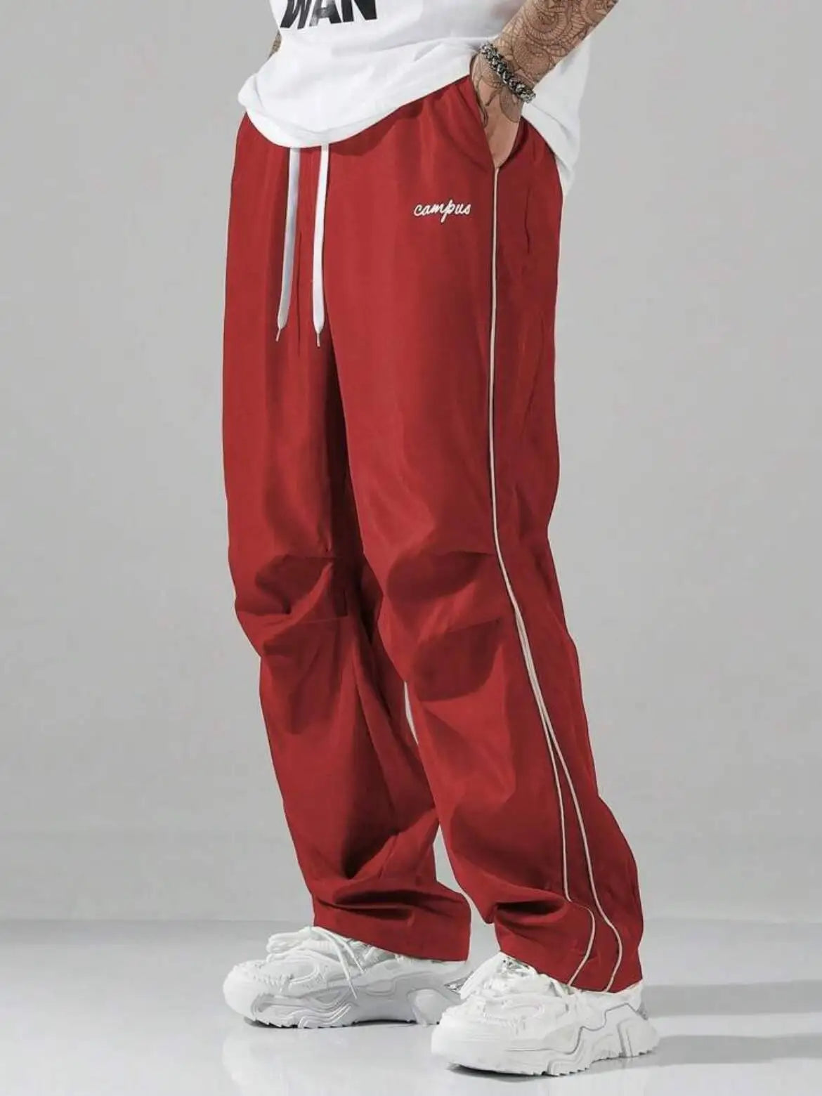 Men's Striped Three - Color Casual Pants with Pockets, Suitable for Sports, Fitness and Jogging  。